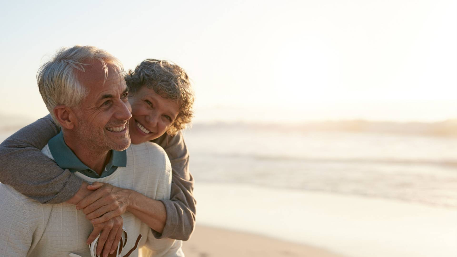 Senior couple having fun at the beach