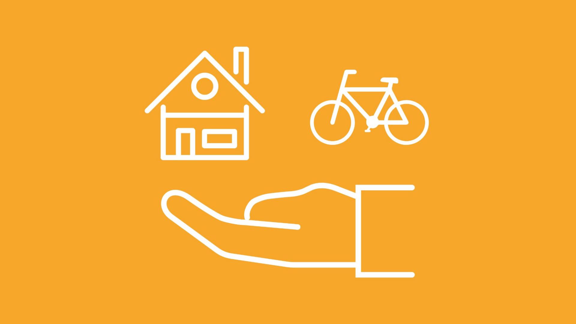 Unter einem Haus und einem Fahrrad ist eine Hand abgebildet, um darzustellen, ob sich eine Hausratversicherung für das Fahrrad lohnt.