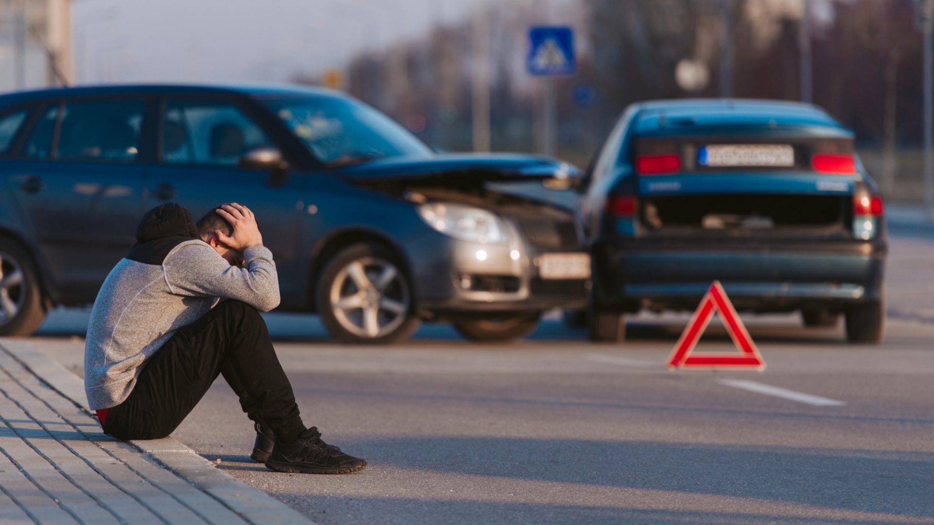 Sad man after car accident